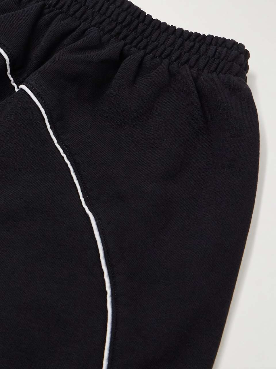 BALENCIAGA - WIDE-LEG DISTRESSED LOGO-APPLIQUÉD COTTON-JERSEY SWEATPANTS